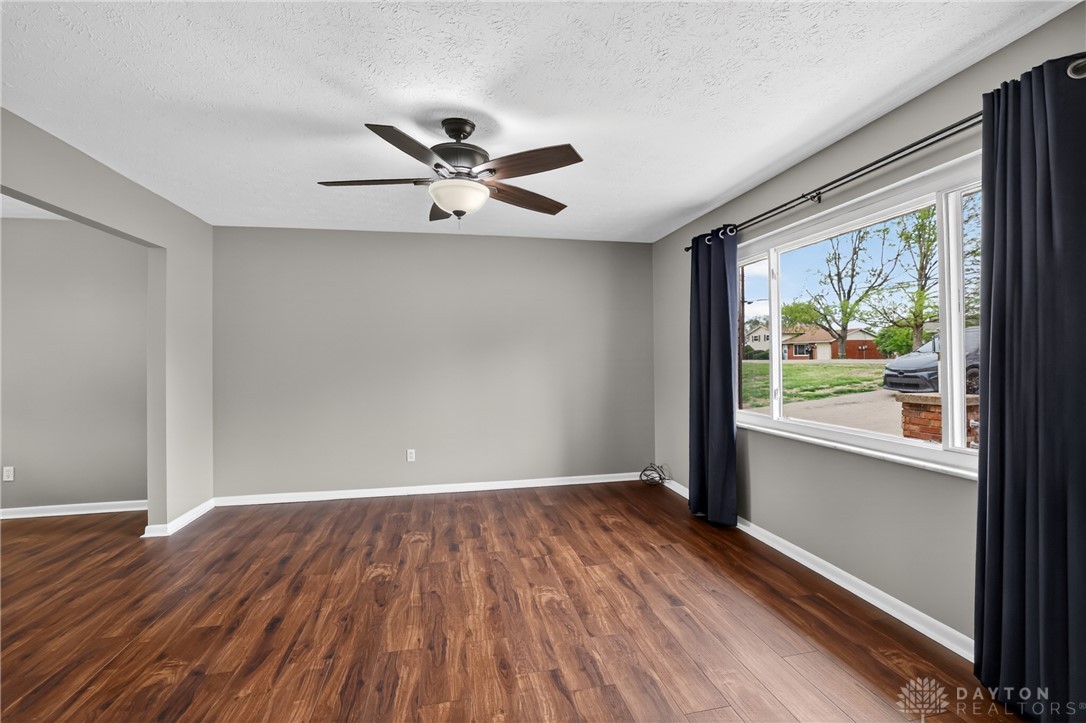 5741 Gray Road Fairfield, OH 45014 - Photo 6 of 32 This inviting living area boasts rich hardwood flooring and ample natural light, perfect for everyday living.