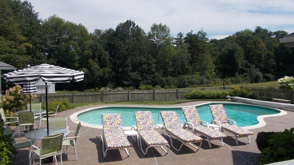 52 S Road Templeton, MA 01468 - Photo 28 of 41 a view of a swimming pool with a patio