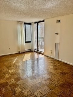 40 Village Road, Unit 610 Middleton, MA 01949 - Photo 27 of 36 a view of an empty room with window and wooden floor