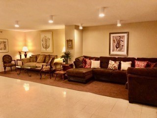 40 Village Road, Unit 610 Middleton, MA 01949 - Photo 31 of 36 a living room with furniture and a large window