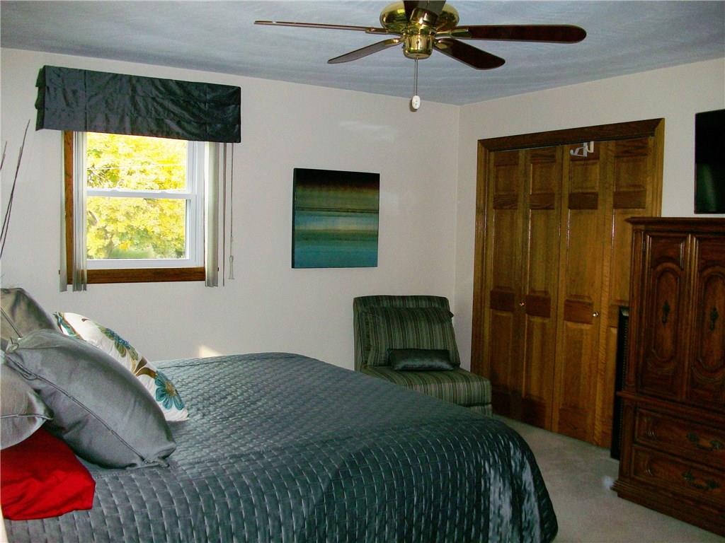 111 Meadowbrook Road Renfrew, PA 16053 - Photo 14 of 25 Every bedroom features neutral carpeting and a ceiling fan.