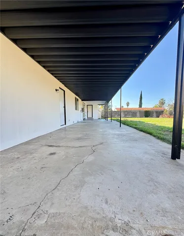 a view of an empty room with a balcony
