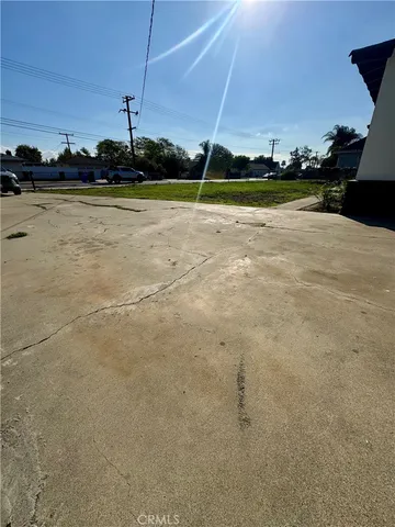 a view of a swimming pool and an outdoor space