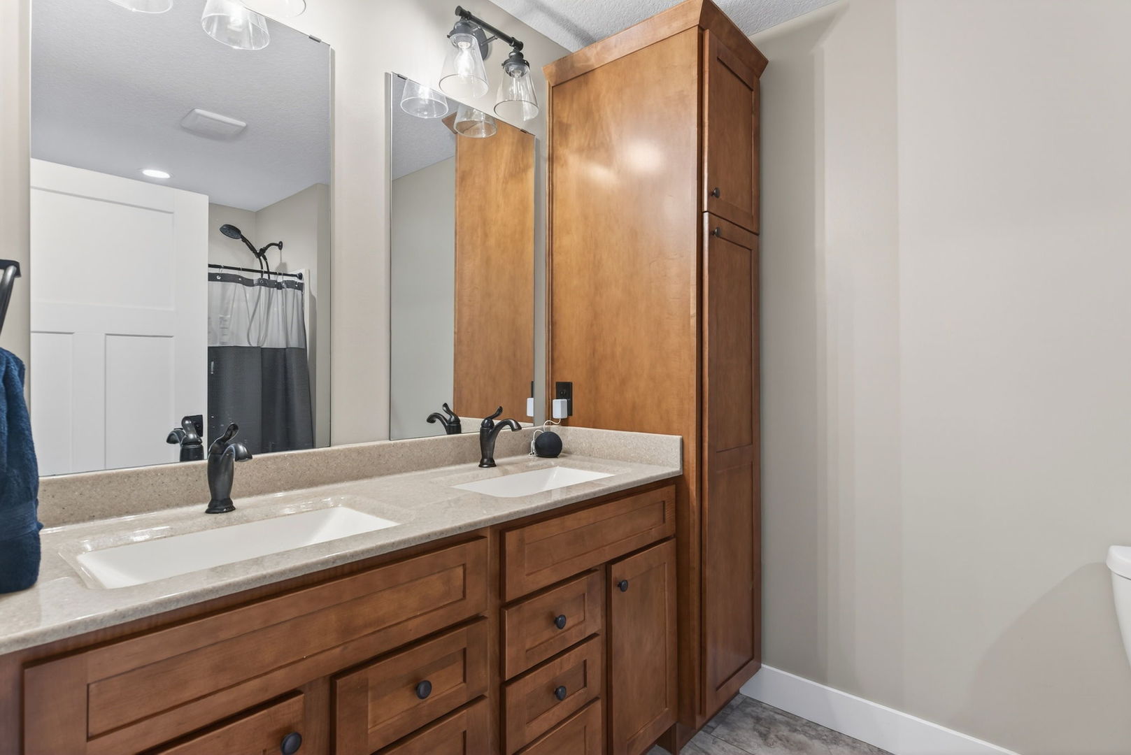 1439 Rhinelander Drive Davenport, IA 52804 - Photo 14 of 43 a bathroom with a sink and a mirror