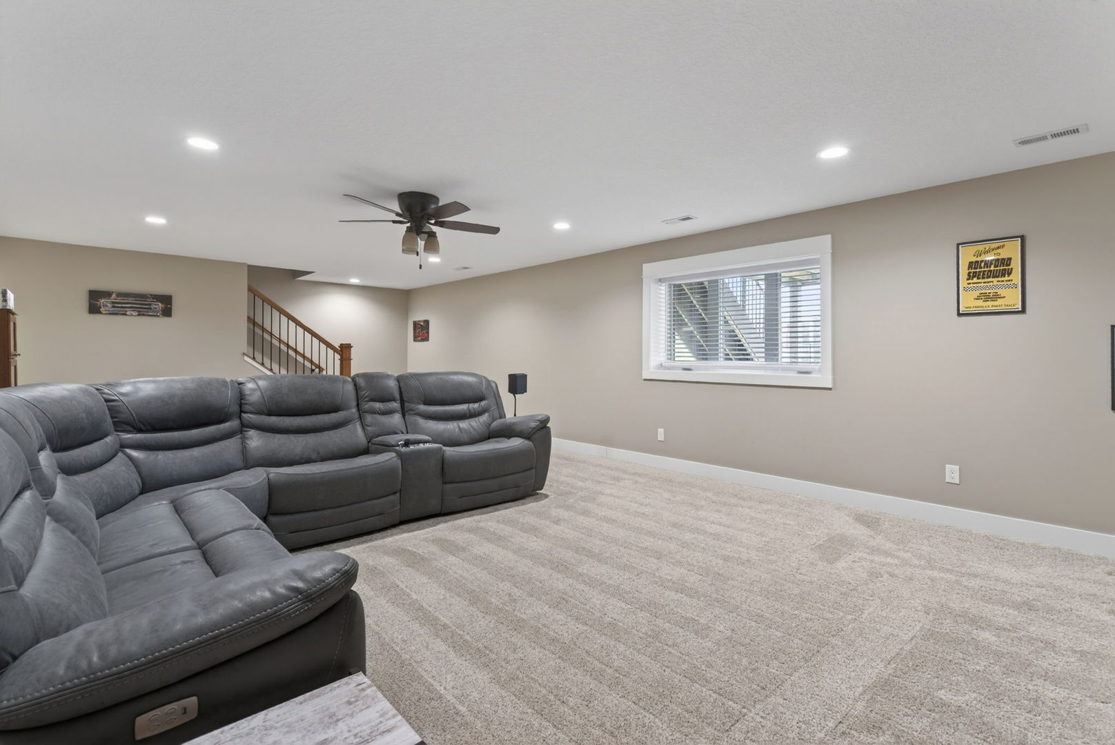 1439 Rhinelander Drive Davenport, IA 52804 - Photo 21 of 43 a living room with furniture and a ceiling fan