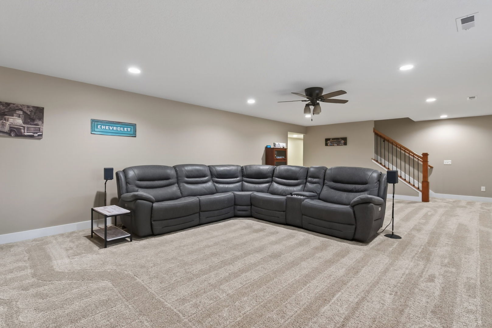 1439 Rhinelander Drive Davenport, IA 52804 - Photo 22 of 43 a living room with a couch and a ceiling fan
