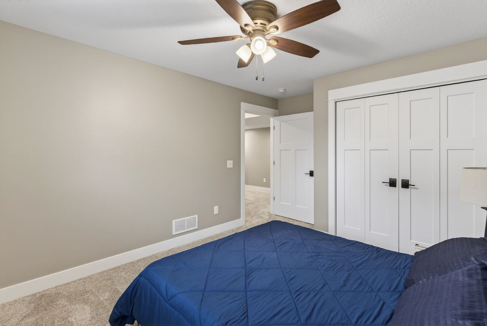 1439 Rhinelander Drive Davenport, IA 52804 - Photo 24 of 43 a view of empty room with wooden floor and fan