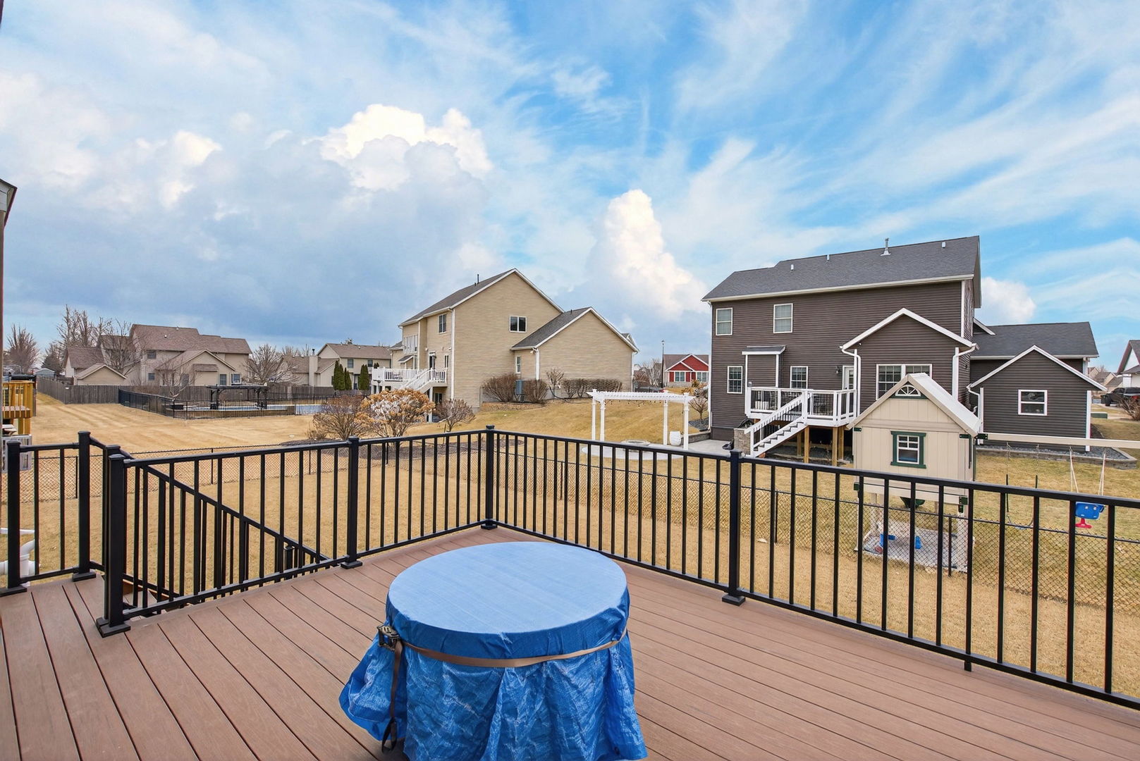 1439 Rhinelander Drive Davenport, IA 52804 - Photo 28 of 43 a view of a wooden roof deck