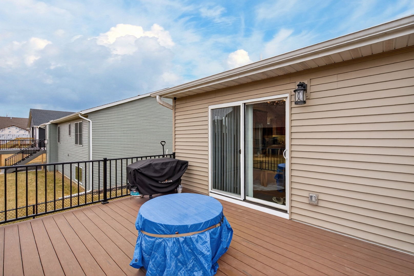 1439 Rhinelander Drive Davenport, IA 52804 - Photo 29 of 43 a view of a two chairs on the deck