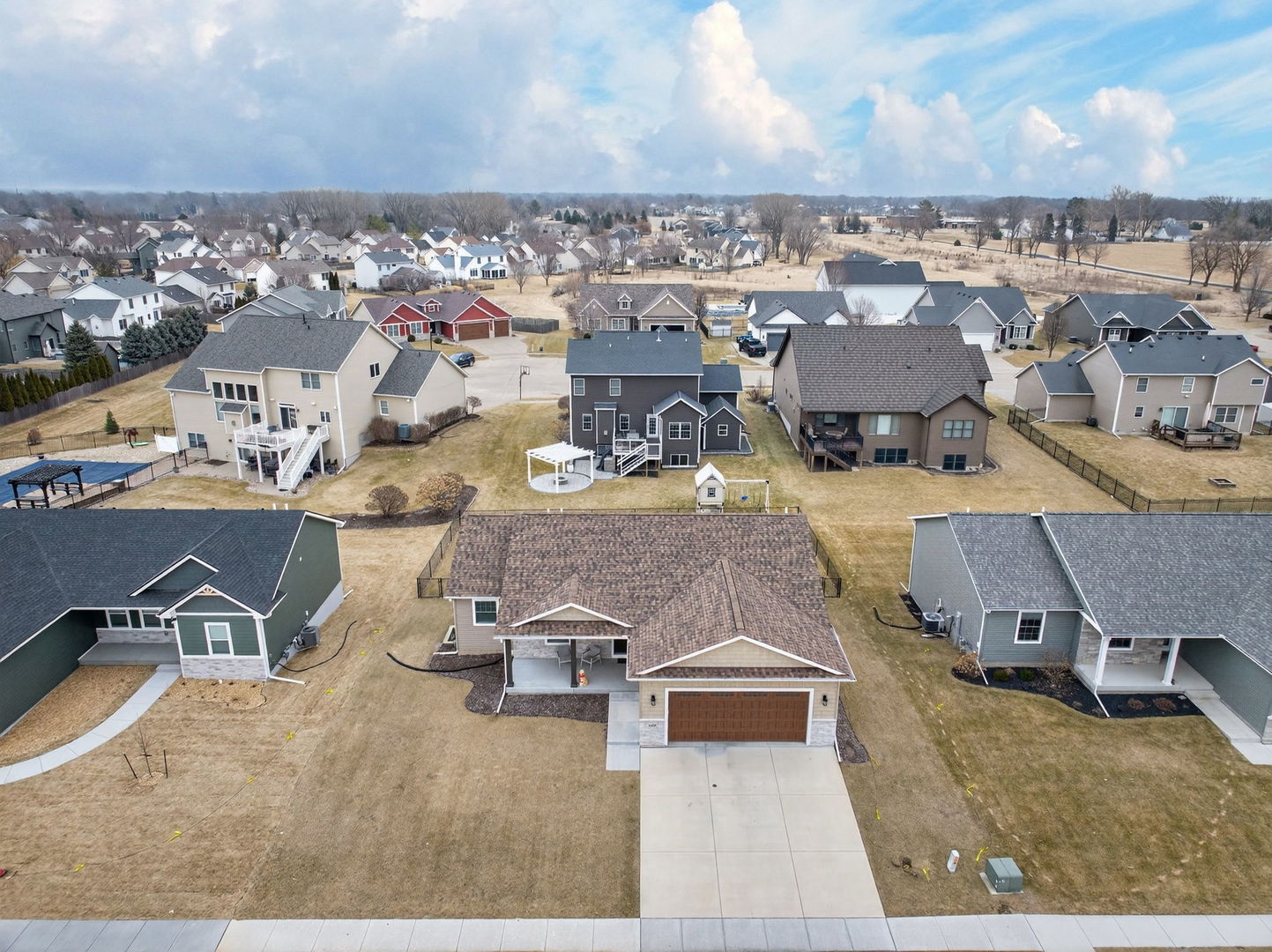 1439 Rhinelander Drive Davenport, IA 52804 - Photo 33 of 43 an aerial view of a house with a swimming pool