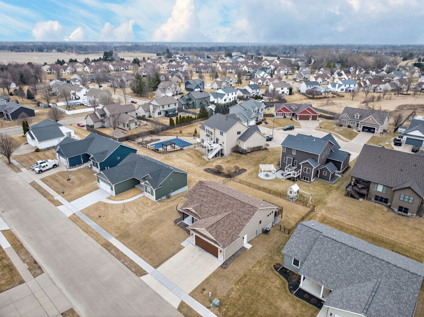 1439 Rhinelander Drive Davenport, IA 52804 - Photo 34 of 43 an aerial view of a city with lots of residential buildings