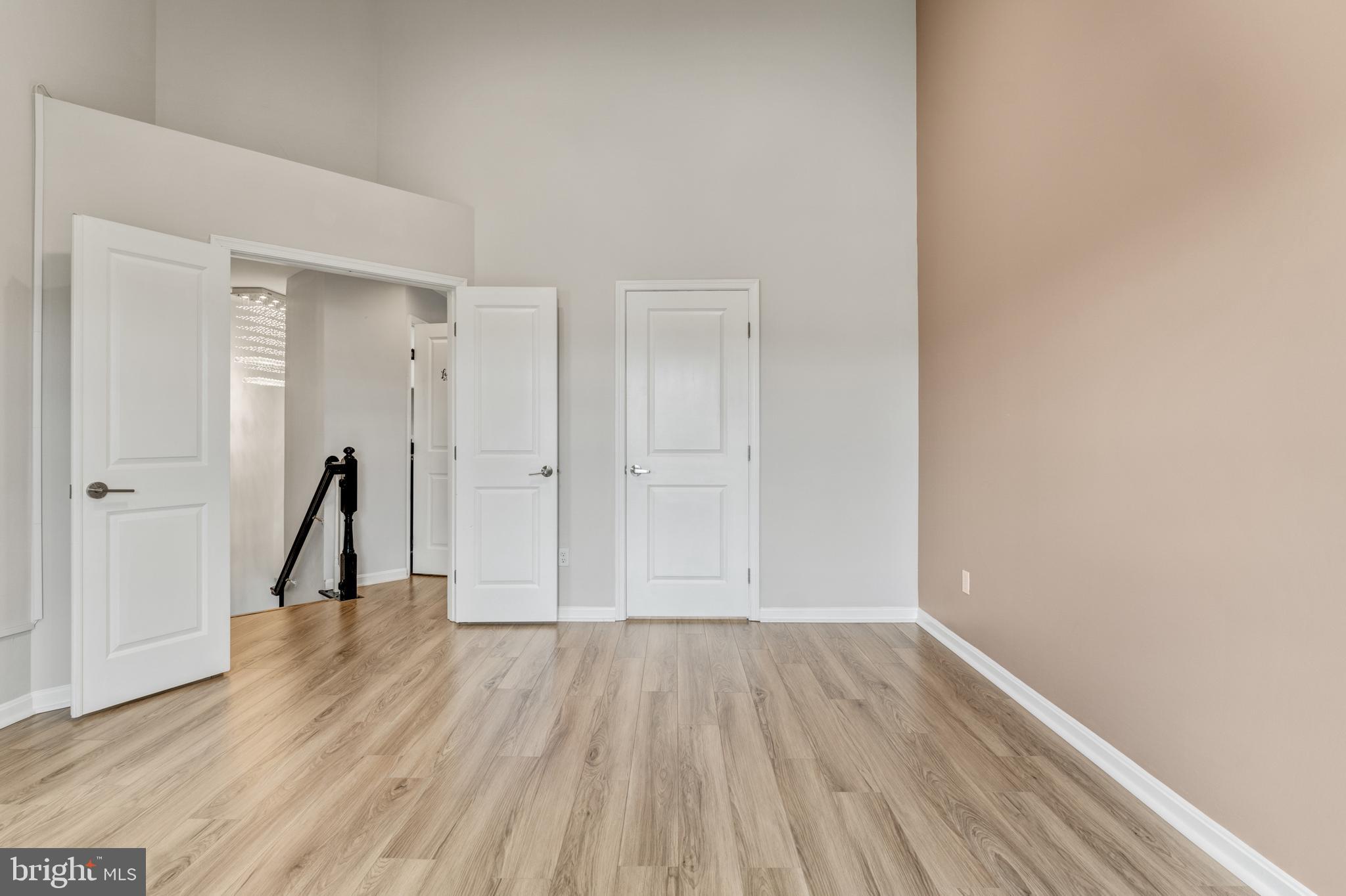 9183 Cascade Falls Drive Bristow, VA 20136 - Photo 32 of 45 a view of empty room with wooden floor