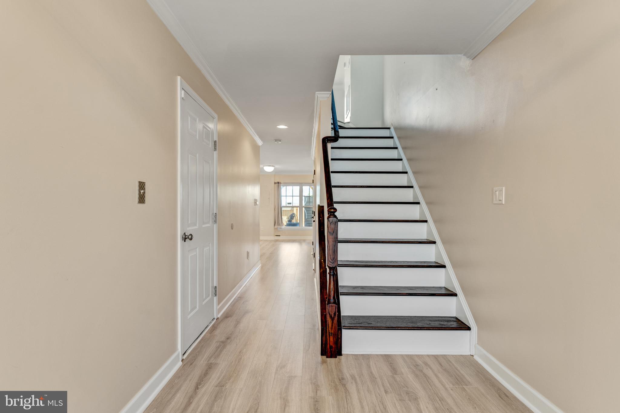 9183 Cascade Falls Drive Bristow, VA 20136 - Photo 9 of 45 a view of entryway with wooden floor
