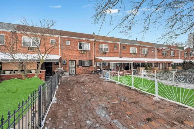 a house view with a garden space