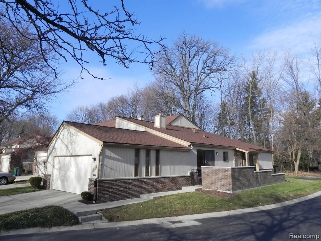Gorgeous updated 2 bed 2 bath first floor condo with 2 car garage and full basement