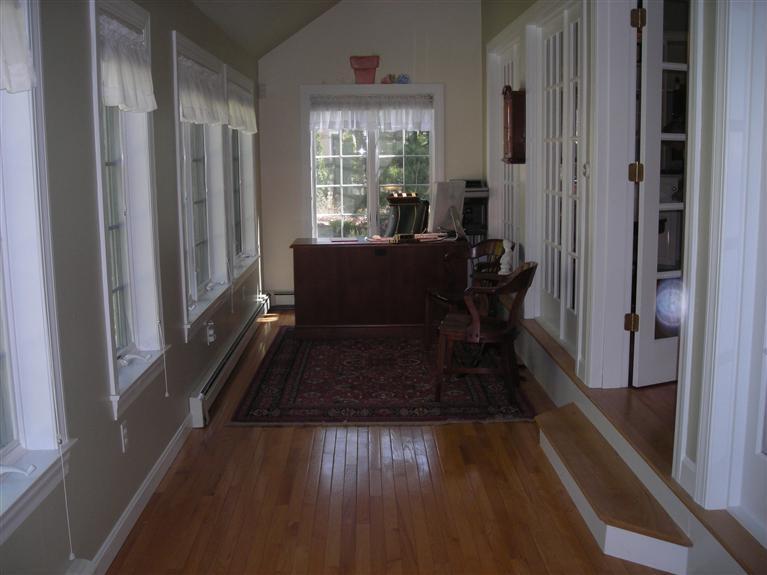 46 Amos Landing Road Mashpee, MA 02649 - Photo 3 of 16 a living room with furniture and a large window
