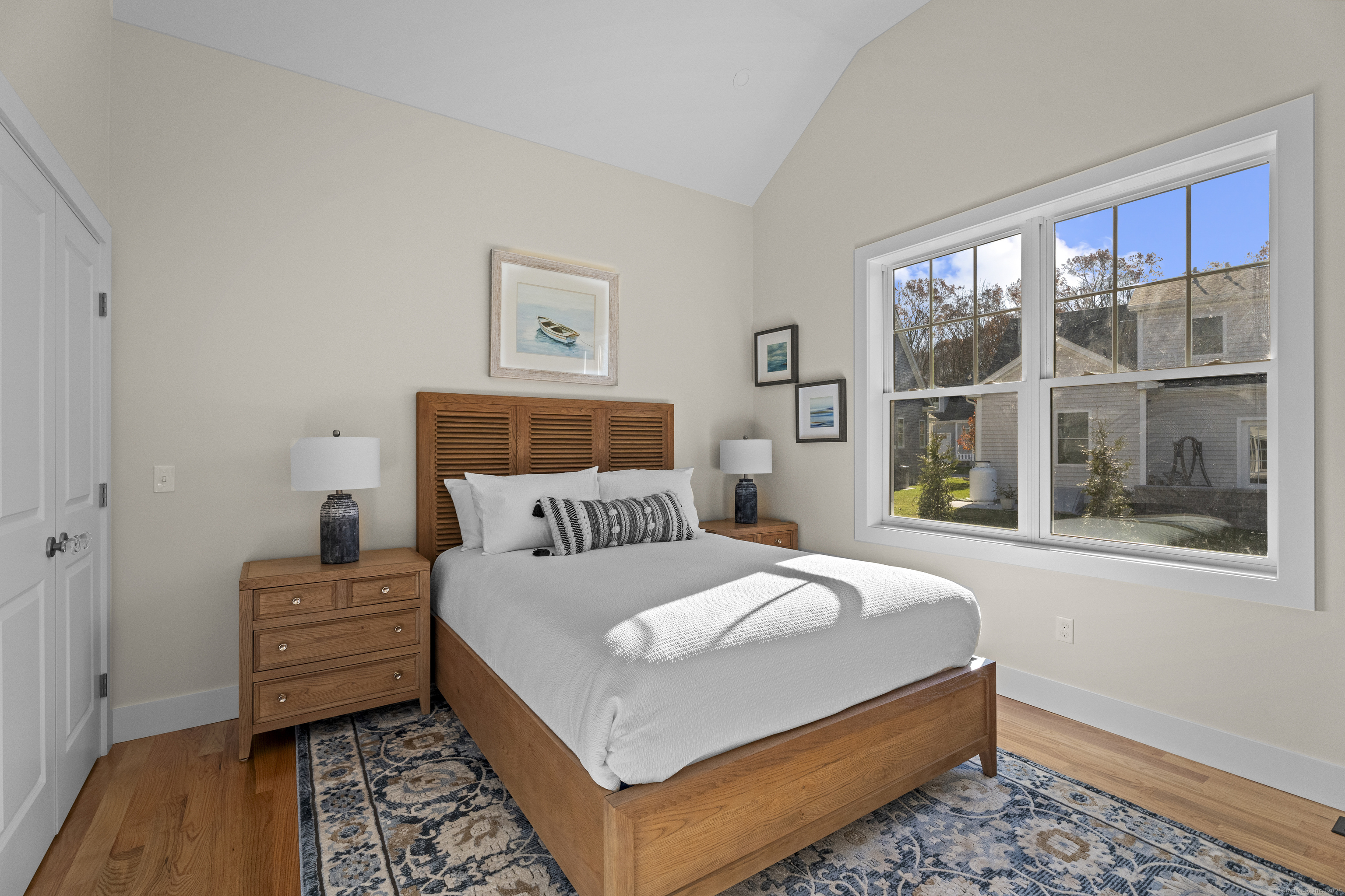 7 Ivy Hill Road, Unit 7 Waterford, CT 06385 - Photo 14 of 35 a bedroom with a bed and window