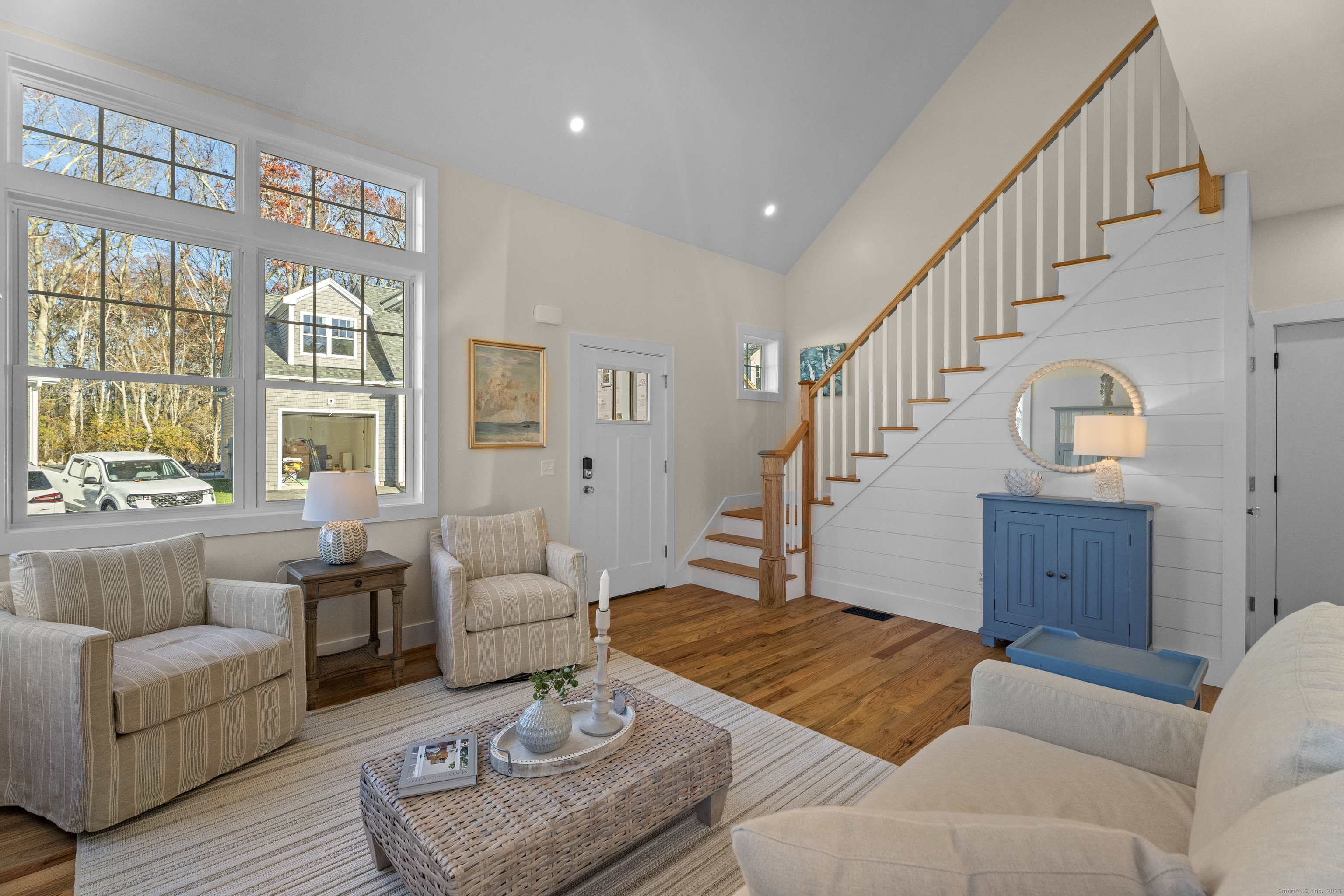 7 Ivy Hill Road, Unit 7 Waterford, CT 06385 - Photo 19 of 35 a living room with furniture or couch and a large window