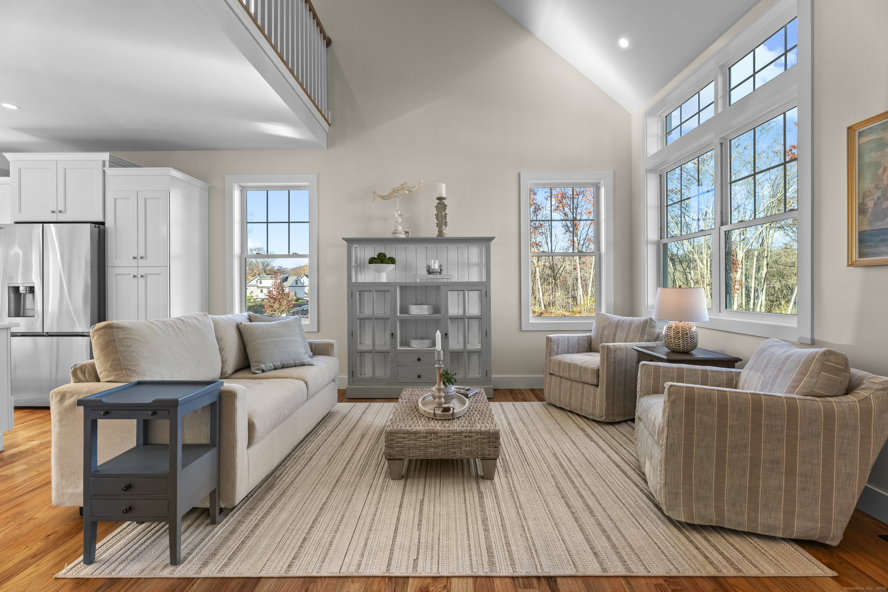 7 Ivy Hill Road, Unit 7 Waterford, CT 06385 - Photo 20 of 35 a living room with furniture and a large window