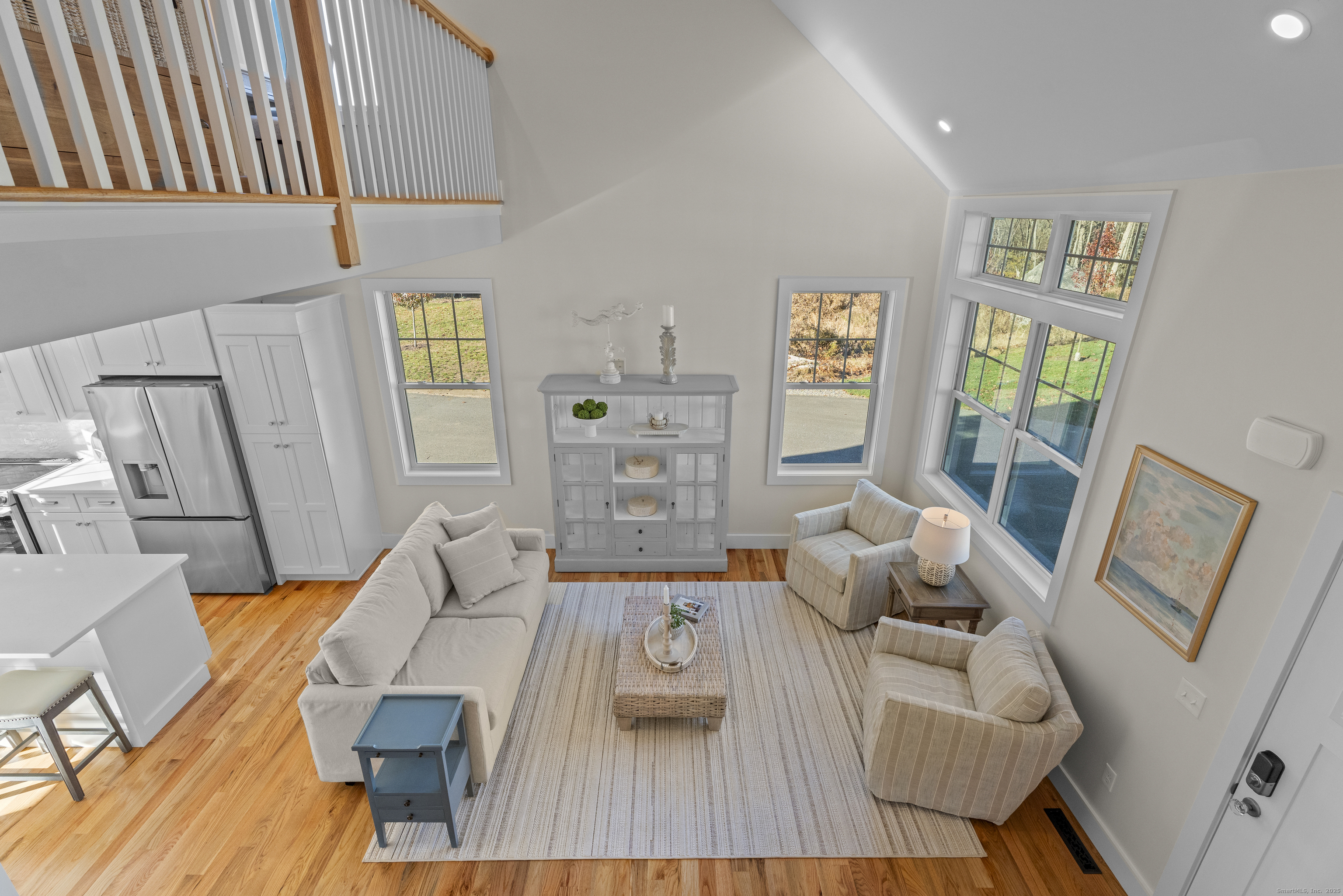 7 Ivy Hill Road, Unit 7 Waterford, CT 06385 - Photo 22 of 35 a living room with furniture and a wooden floor