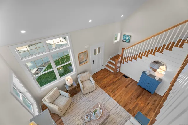 a living room with furniture and a table
