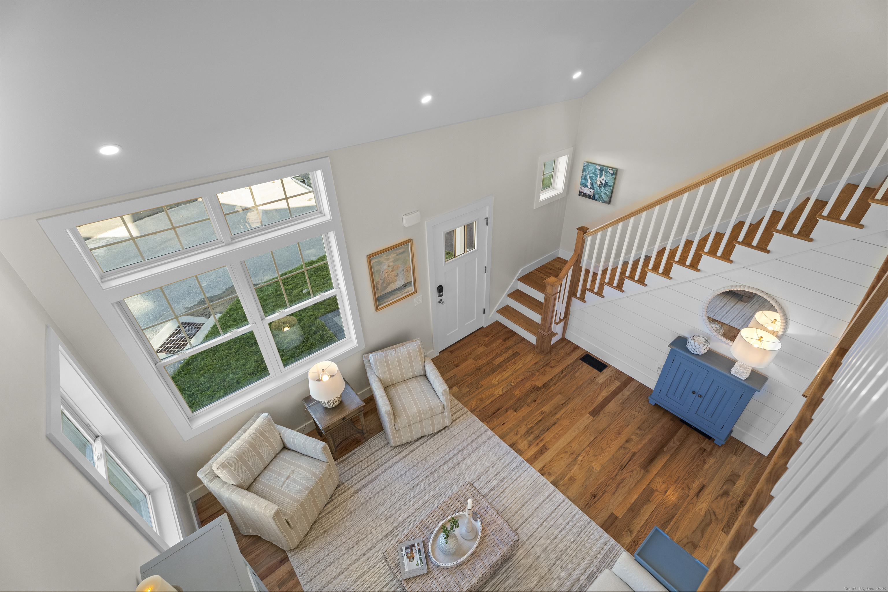 7 Ivy Hill Road, Unit 7 Waterford, CT 06385 - Photo 23 of 35 a living room with furniture and a table