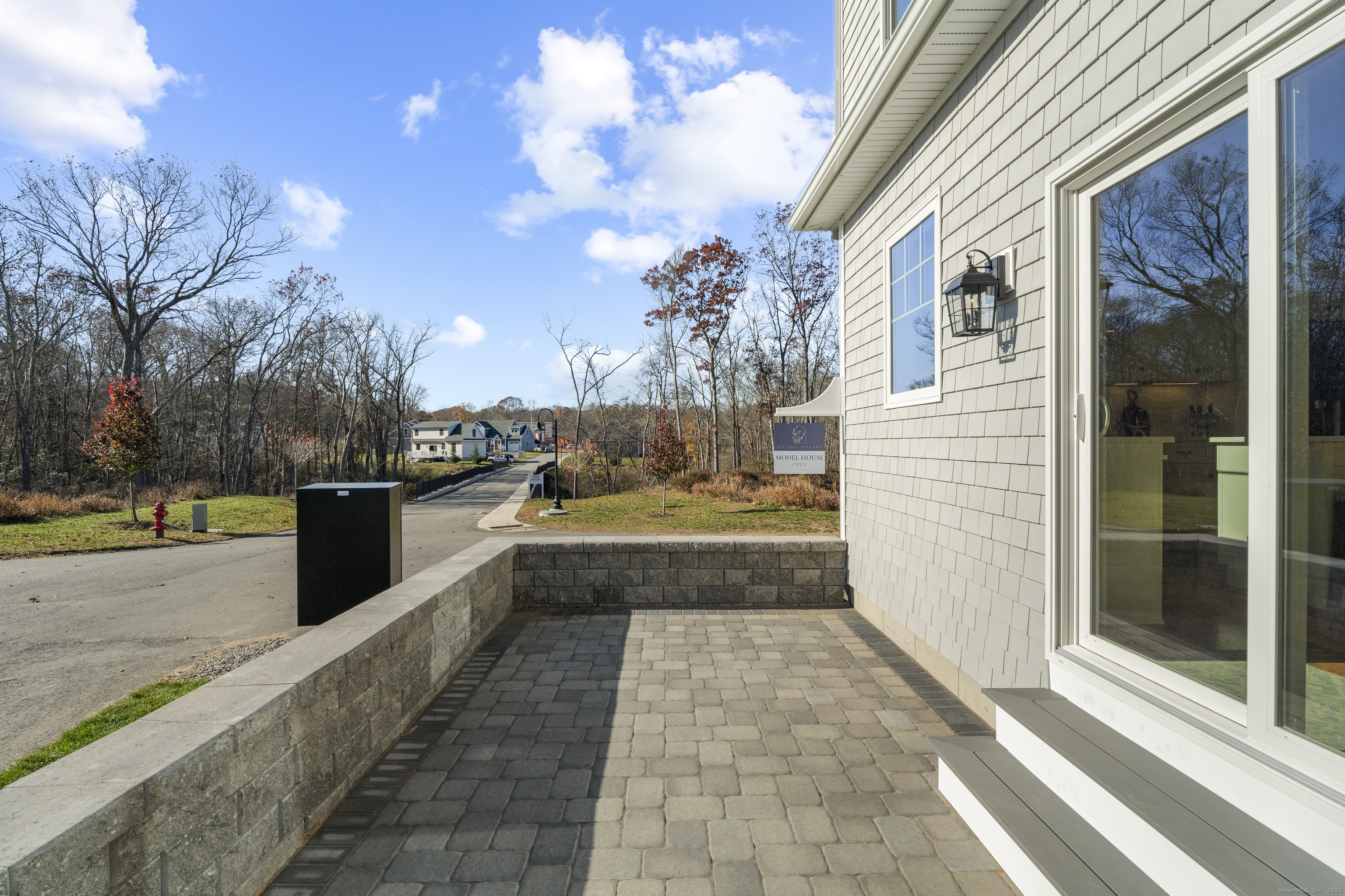 7 Ivy Hill Road, Unit 7 Waterford, CT 06385 - Photo 26 of 35 a view of a house with backyard outdoor space with swimming pool