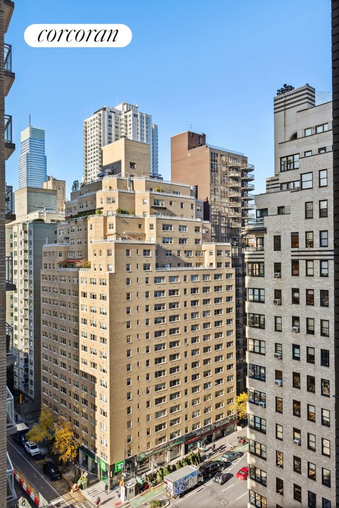 400 East 56th Street, Unit 17F Manhattan, NY 10022 - Photo 3 of 9 a view of a city with tall buildings