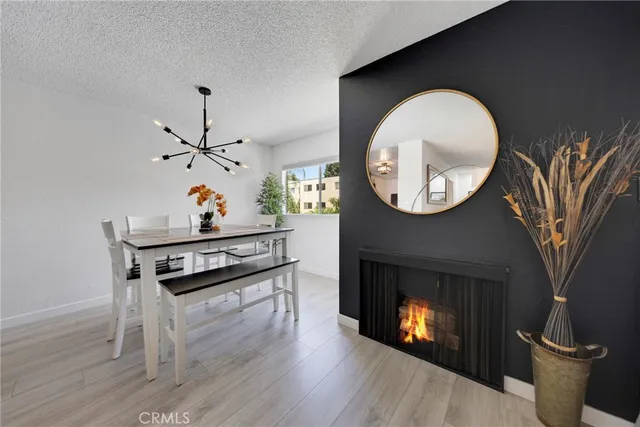 a kitchen with a stove and a fireplace