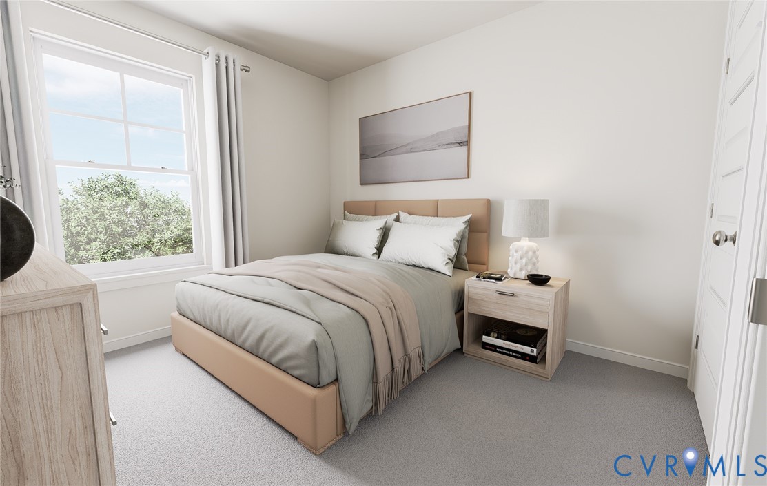 286 Greenpark Road Sandston, VA 23150 - Photo 19 of 26 a bedroom with a bed and a window