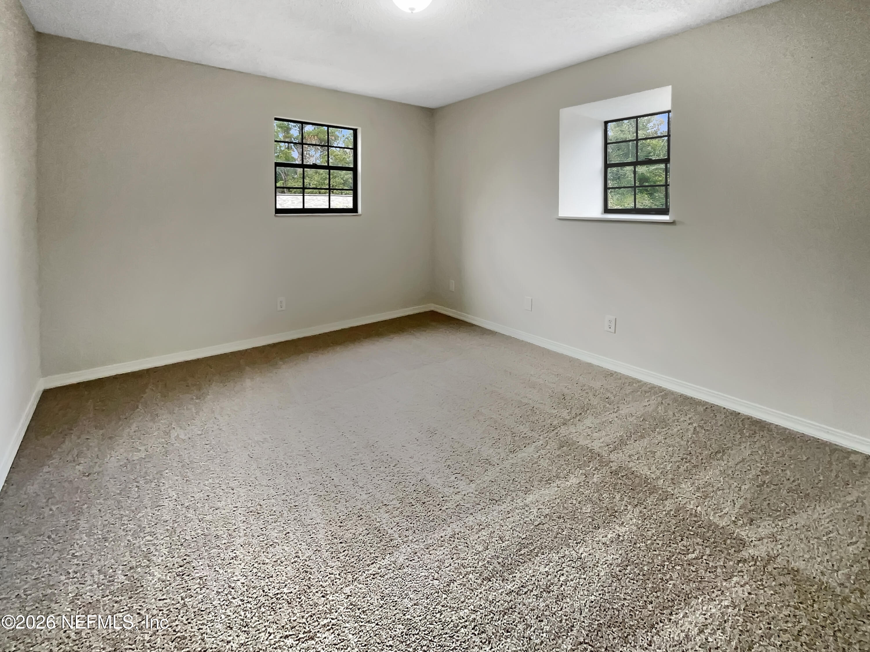 1555 Dolph Road Jacksonville, FL 32220 - Photo 16 of 21 an empty room with a window