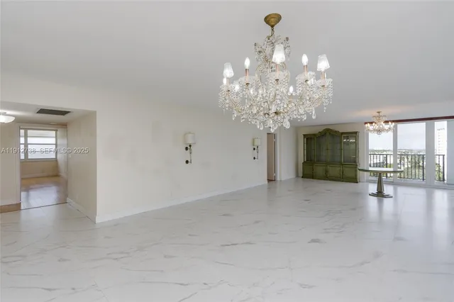a very nice looking room with a chandelier
