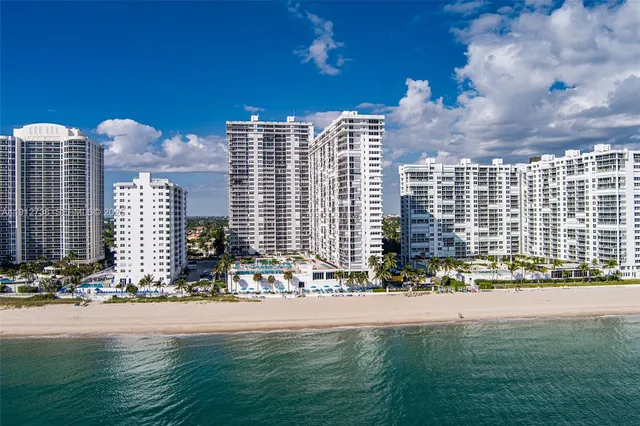 a view of a city with tall buildings