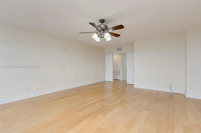 an aerial view of residential houses with outdoor space and swimming pool