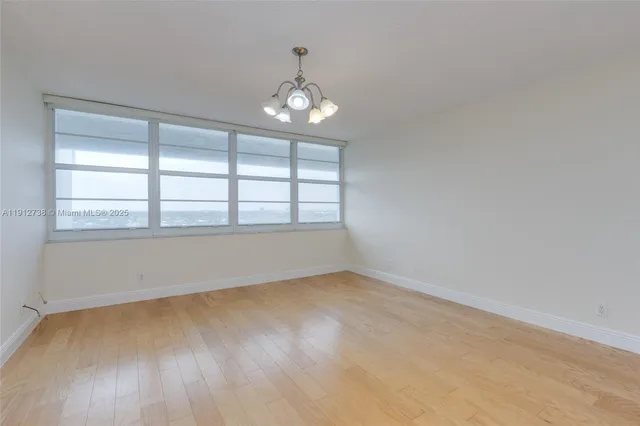 a bathroom with a double vanity sink a mirror and shower
