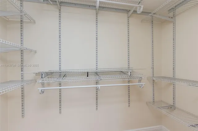 a view of swimming pool with a lake view