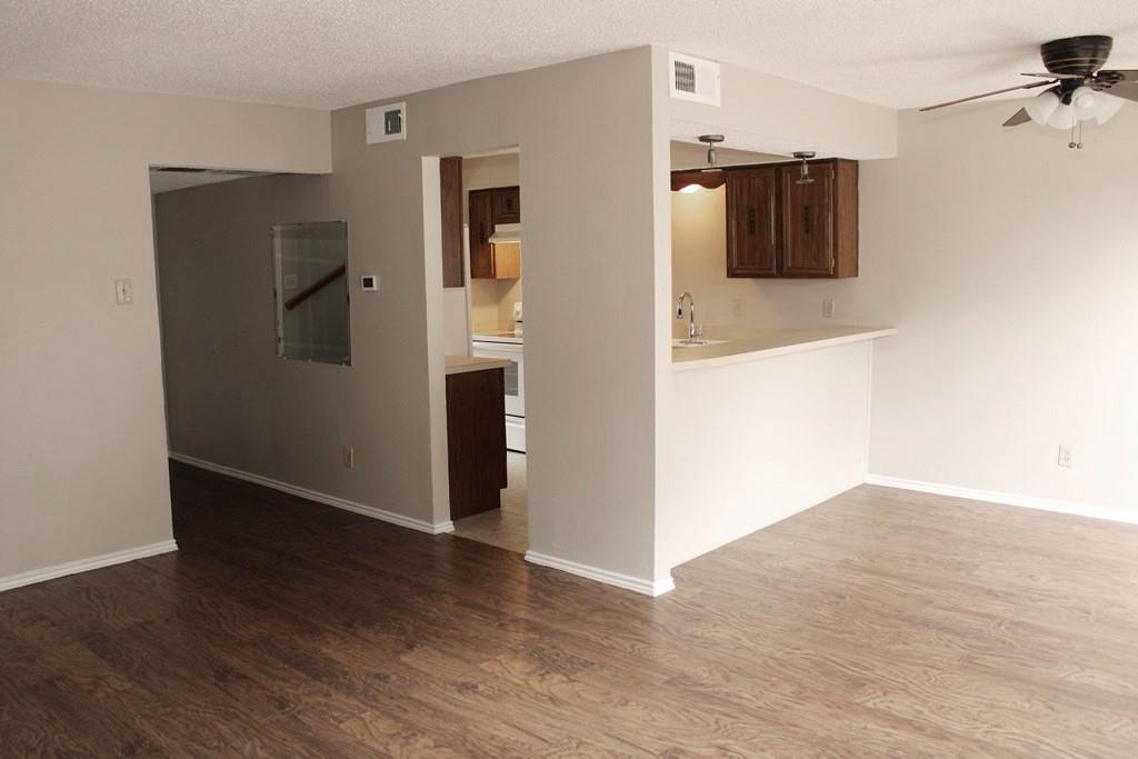 1725 East Grauwyler Road, Unit 138 Irving, TX 75061 - Photo 7 of 20 Living/Dining/Kitchen