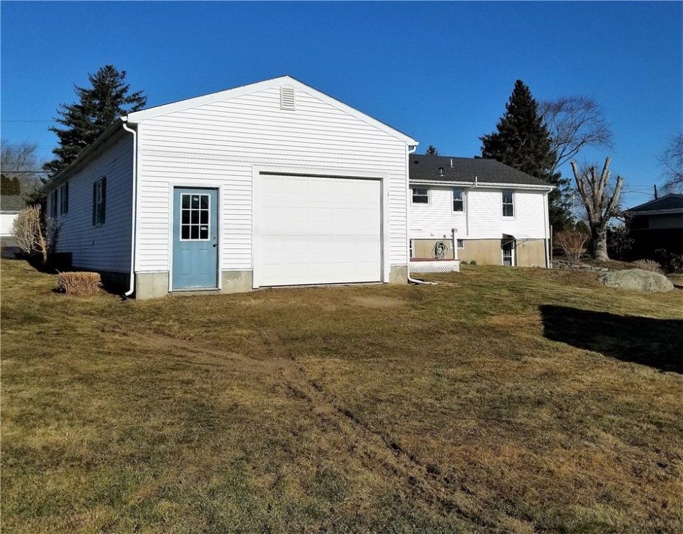 63 Long Meadow Road Portsmouth, RI 02871 - Photo 3 of 27 back additional attached garage 20x30