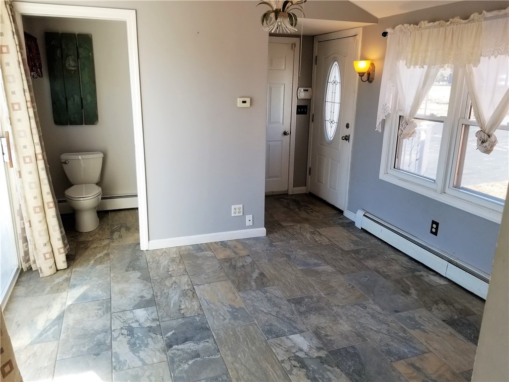 63 Long Meadow Road Portsmouth, RI 02871 - Photo 9 of 27 dining room or a bonus room between the garage and the kitchen