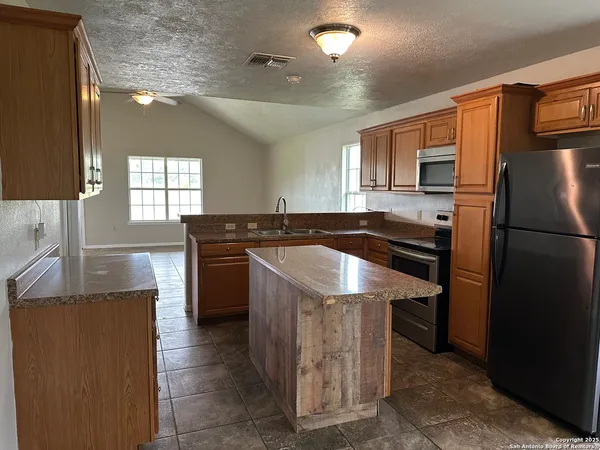 an empty room with a empty space and window