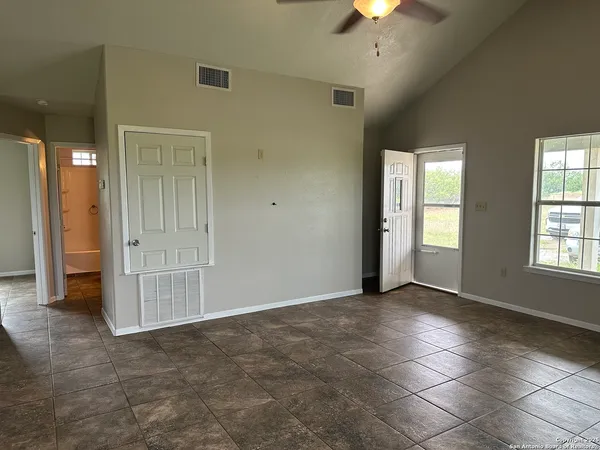 a view of a yard with porch and outdoor seating