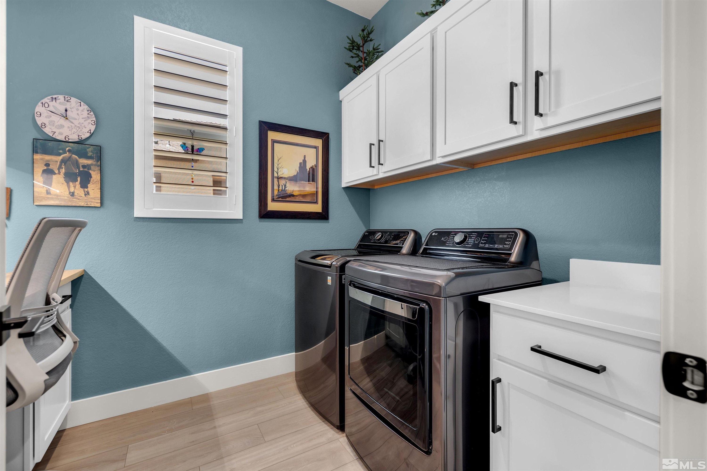 7341 Rustic Sky Drive Sparks, NV 89436 - Photo 15 of 40 a utility room with dryer and washer