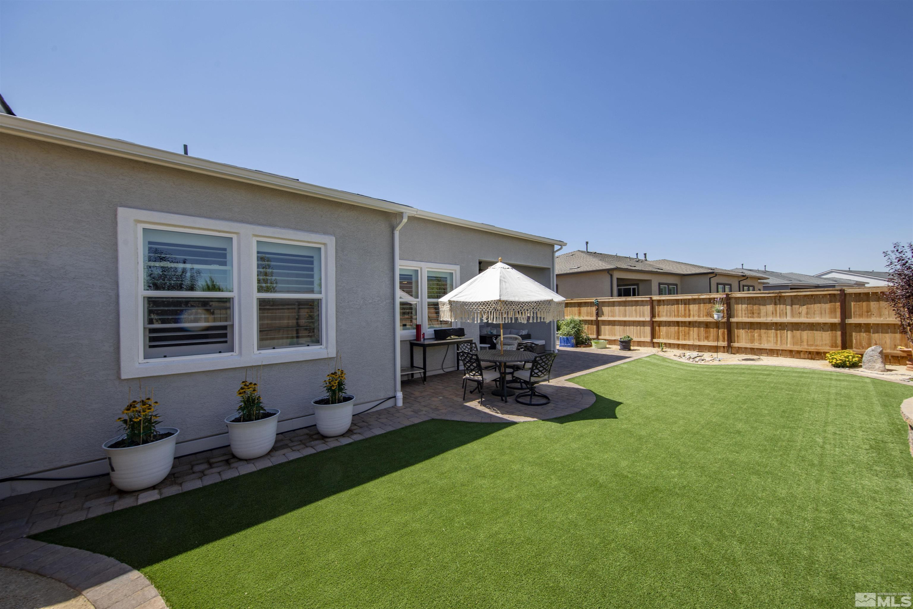 7341 Rustic Sky Drive Sparks, NV 89436 - Photo 31 of 40 a living room with furniture pool table and chairs