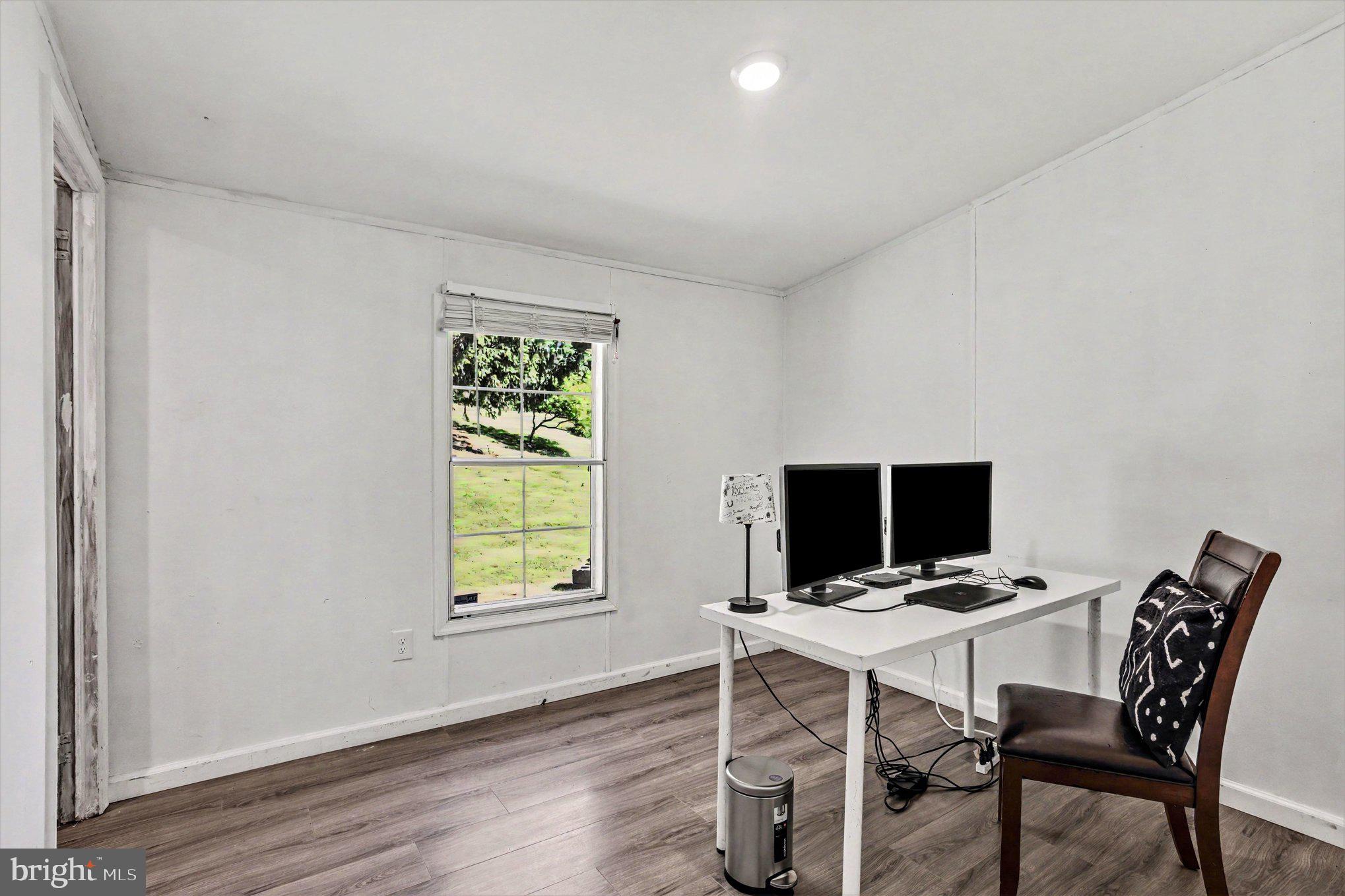 2002 David Drive Edgewood, MD 21040 - Photo 19 of 26 a view of a workspace with furniture and a window