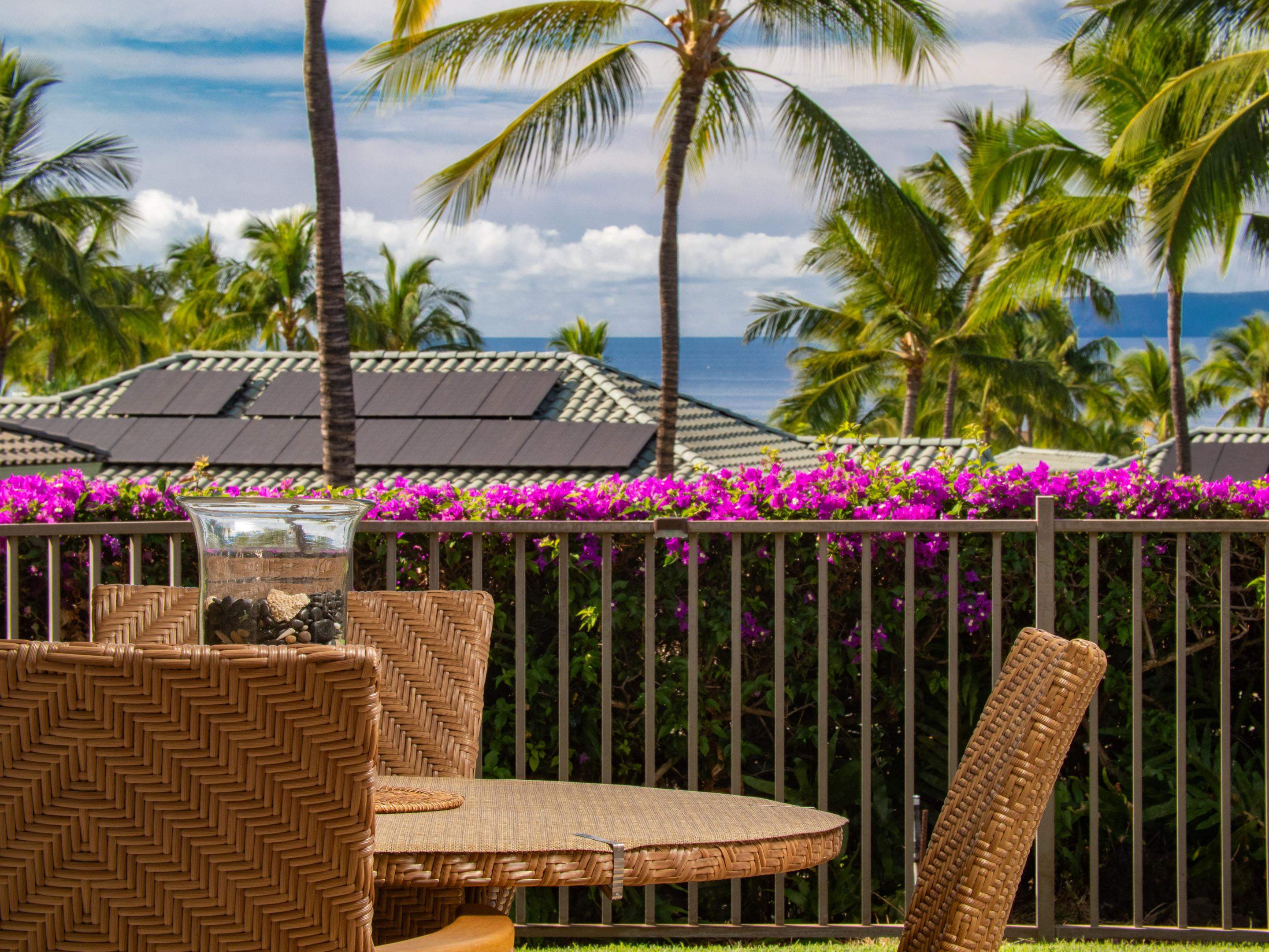 72 Kainui Loop, Unit 70A Kihei, HI 96753 - Photo 20 of 50 a view of a chairs and table in patio