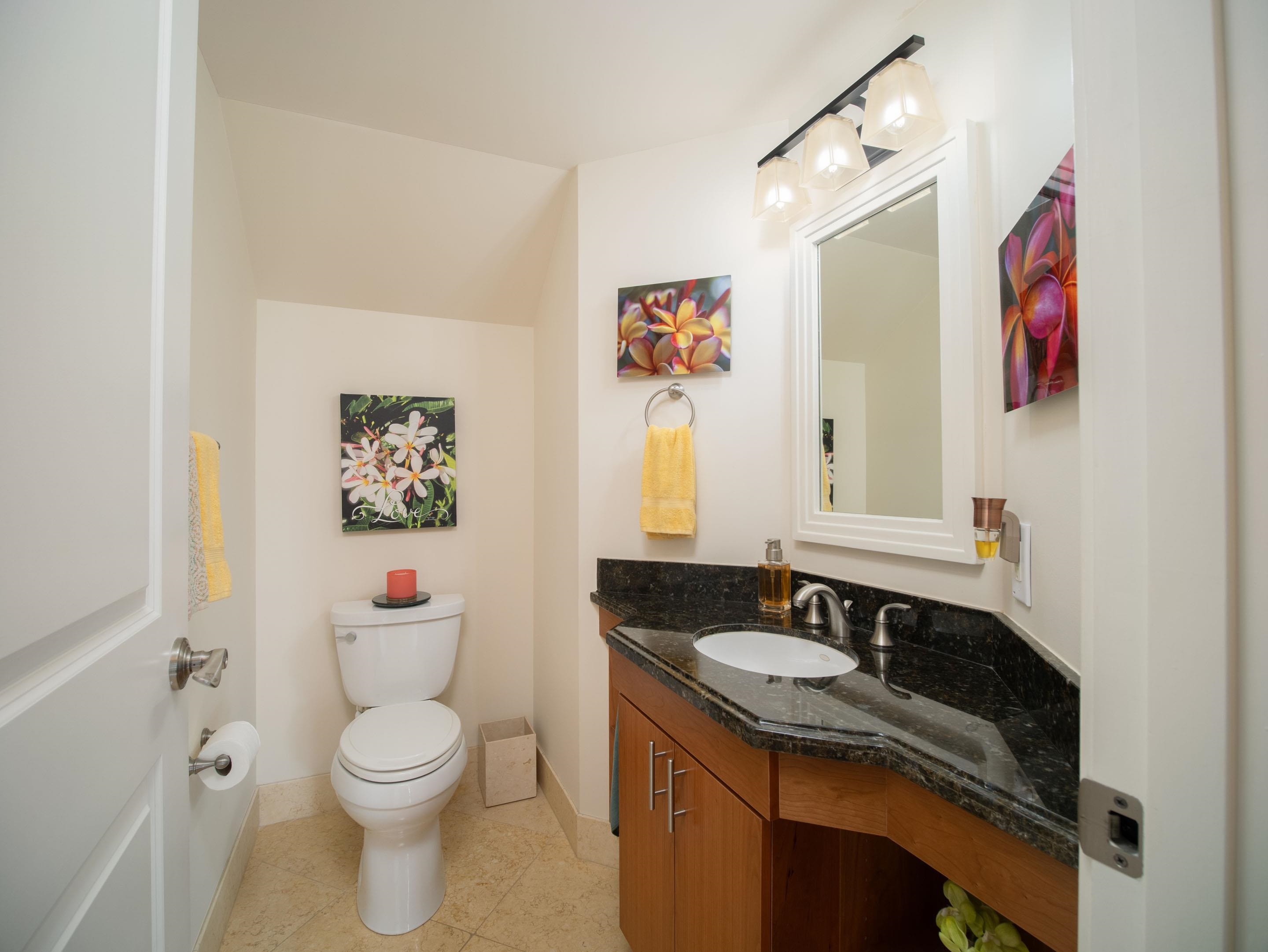 72 Kainui Loop, Unit 70A Kihei, HI 96753 - Photo 26 of 50 a bathroom with a granite countertop sink and a mirror