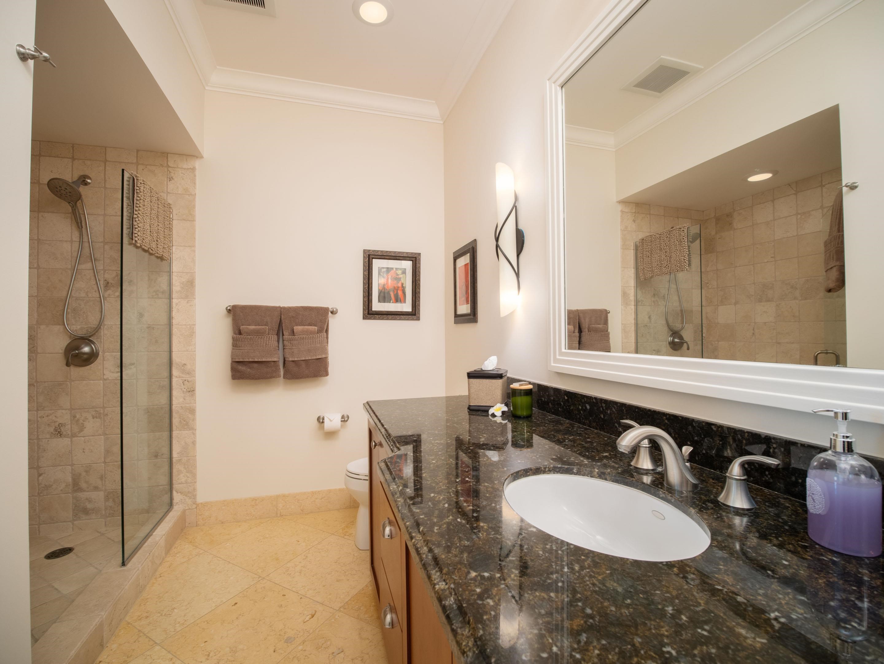 72 Kainui Loop, Unit 70A Kihei, HI 96753 - Photo 39 of 50 a bathroom with a sink double vanity and a mirror