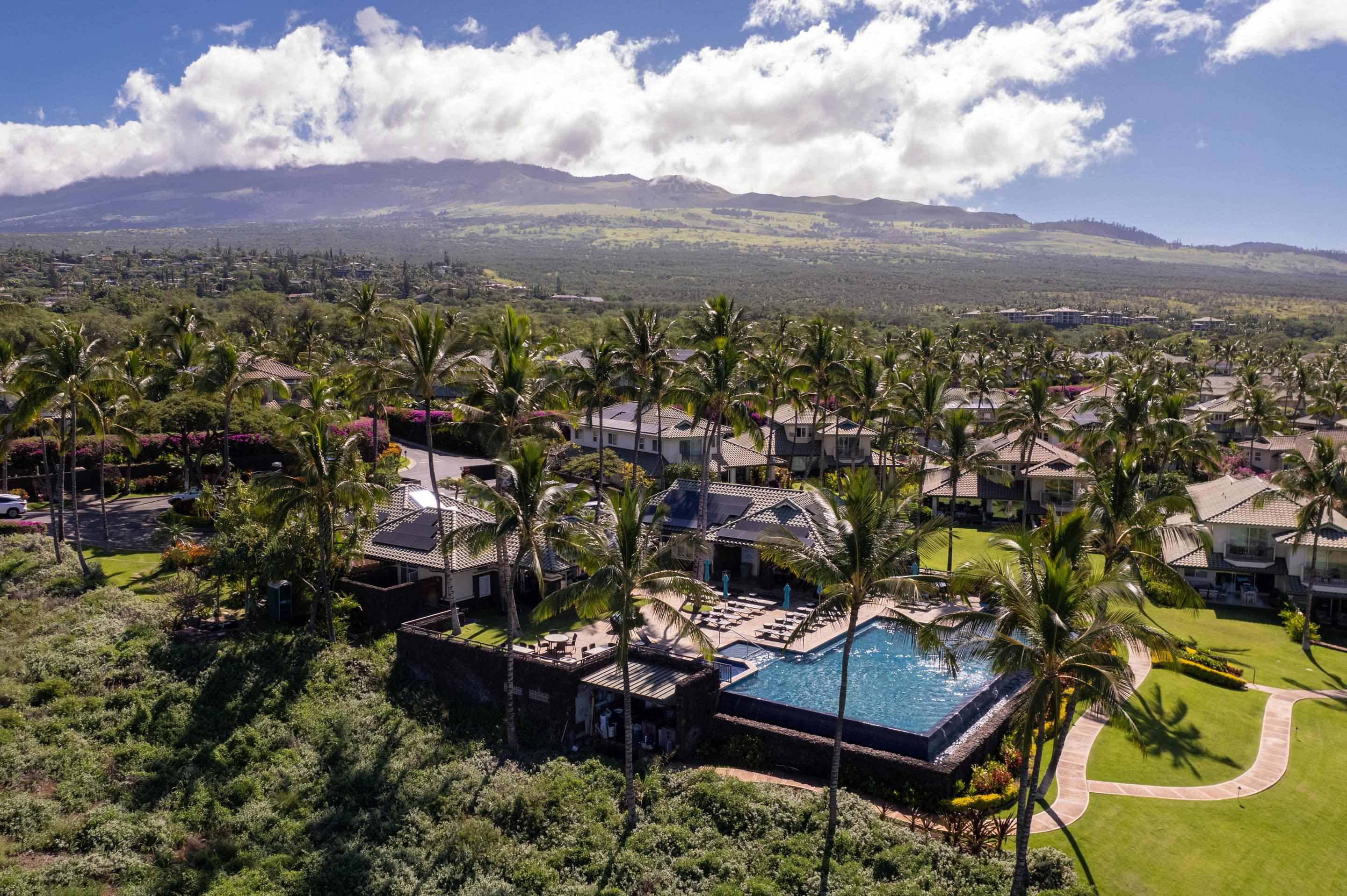72 Kainui Loop, Unit 70A Kihei, HI 96753 - Photo 41 of 50 a view of a city with mountains in the background