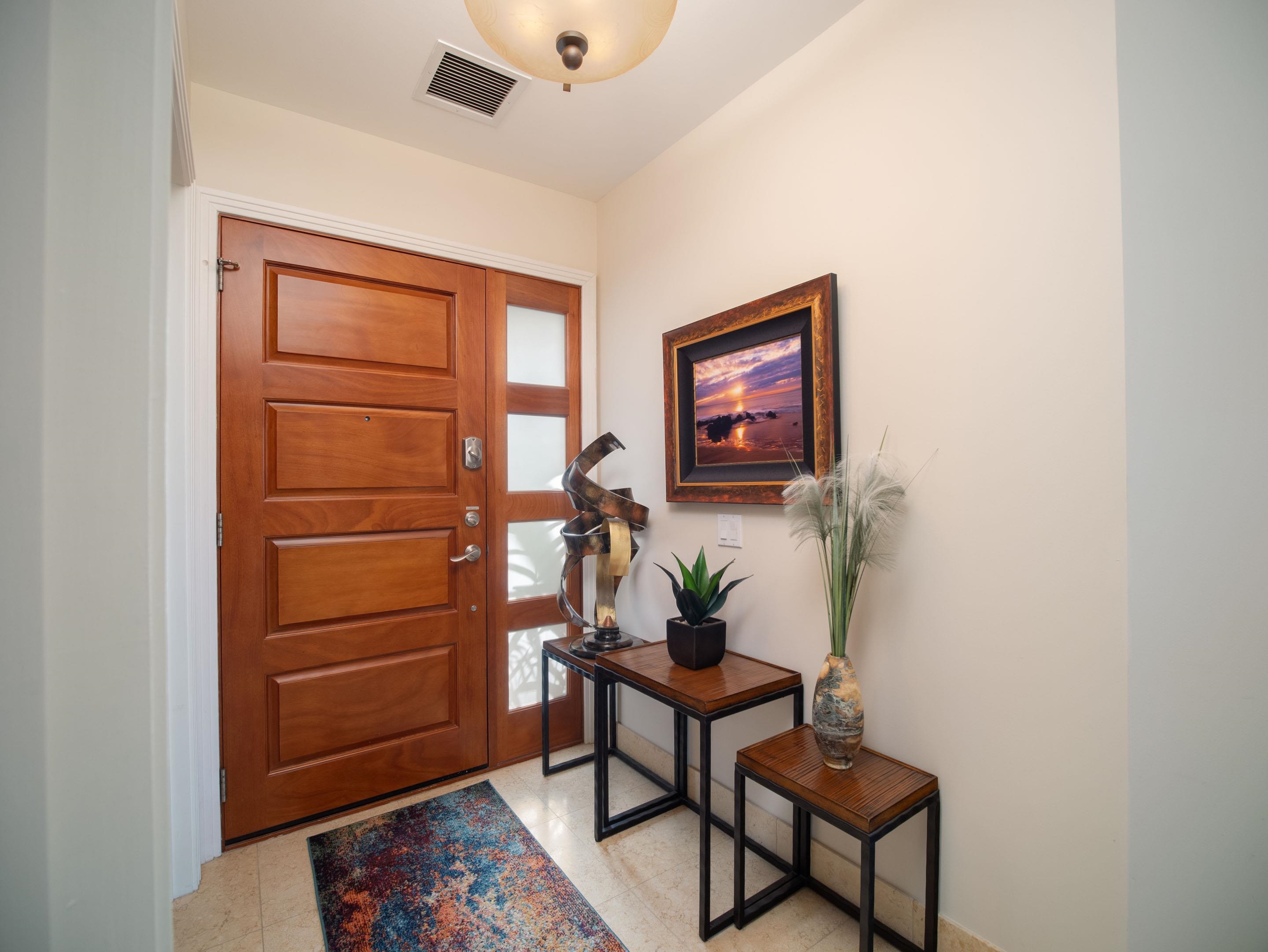 72 Kainui Loop, Unit 70A Kihei, HI 96753 - Photo 7 of 50 a room with furniture and a window