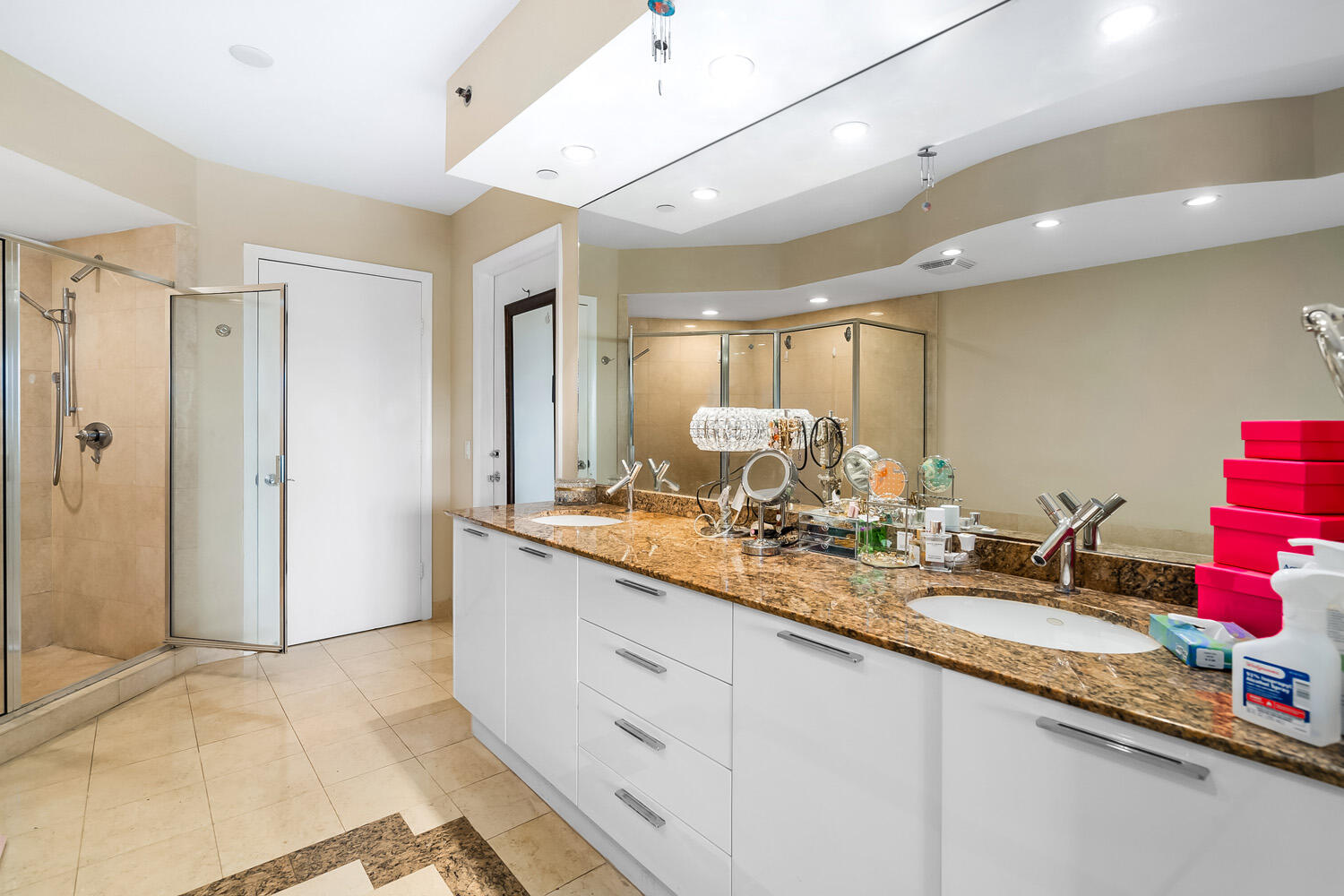 18911 Collins Avenue, Unit 506 ON 5 Sunny Isles Beach, FL 33160 - Photo 33 of 88 a bathroom with a granite countertop sink mirror and double